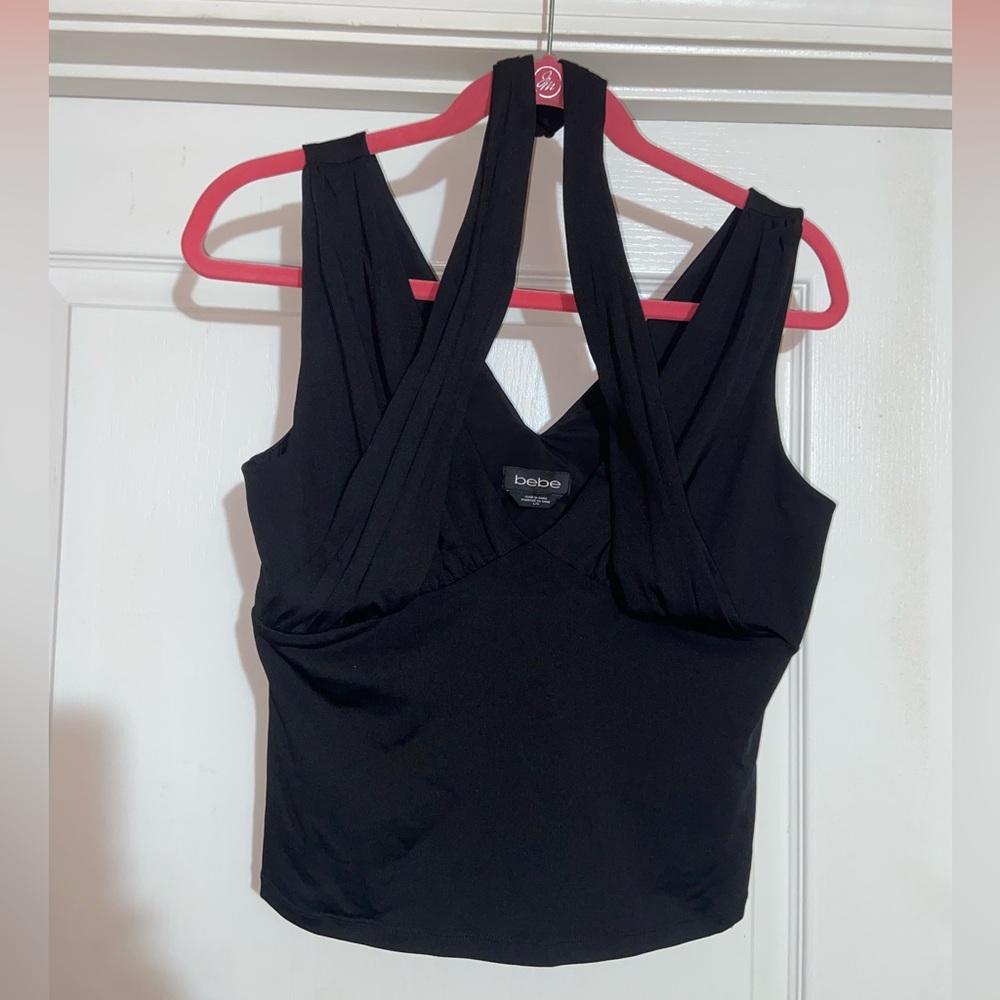NWT Bebe woman’s top sz large.